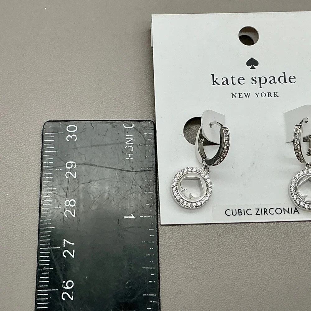 Kate Spade New York Earrings Women Silver Tone Cubic Zirconia Spade Logo Huggie